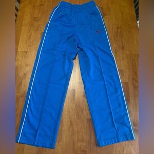 Nike Royal Blue Kids Track Pants with White Piping and Red Swoosh